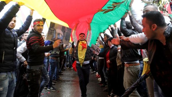 Lebanese Kurds wave flags and chant slogans on Jan. 28, 2018, during a protest near the European Commission offices in Beirut against the ongoing Turkish military campaign in the Kurdish-held Syrian enclave of Afrin (ANWAR AMRO / AFP)
