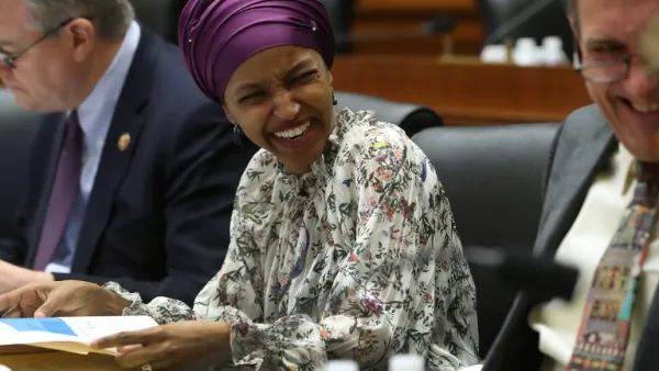 Rep. Ilhan Omar (D-MN) (C) listens to Rep. Andy Levin (D-MI) during a House Education and Labor Committee Markup on the H.R. 582 Raise The Wage Act, in the Rayburn House Office Building on March 6, 2019 in Washington, DC. (Mark Wilson/Getty Images/AFP)