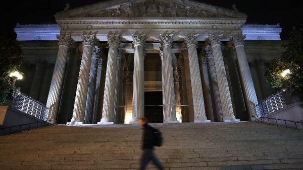 A man walks past the United States National Archives building (AFP/File Photo)	