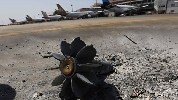 The remains of an explosive device at an airport in Tripoli. (AFP/File)