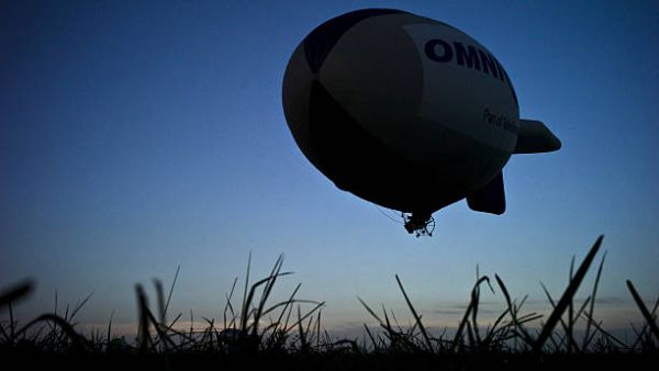 Blimp flying over a meadow (AFP/File Photo)