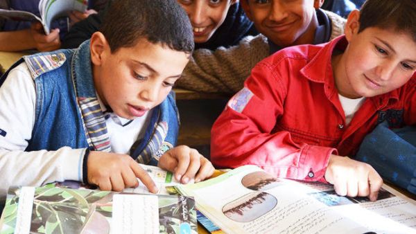 Children read books at school (AFP/File Photo)	