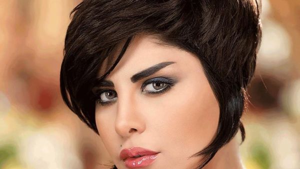 شمس تحصل على تاتو لكامل ظهرها