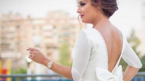 كندا حنا تحتفل بعمادة أطفالها 