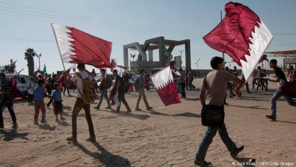 Young people with Qatar flags (AFP/File Photo)	
