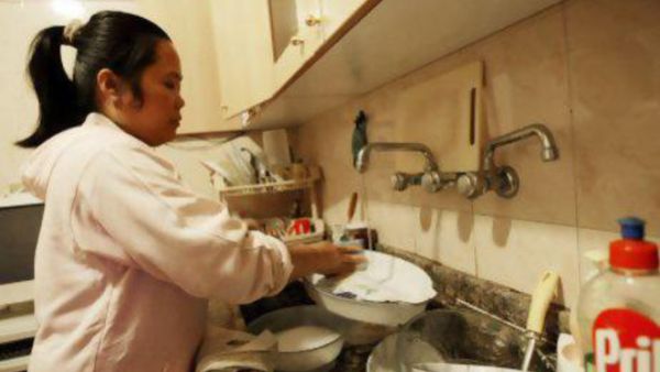 A maid washing the dishes (AFP/File Photo)