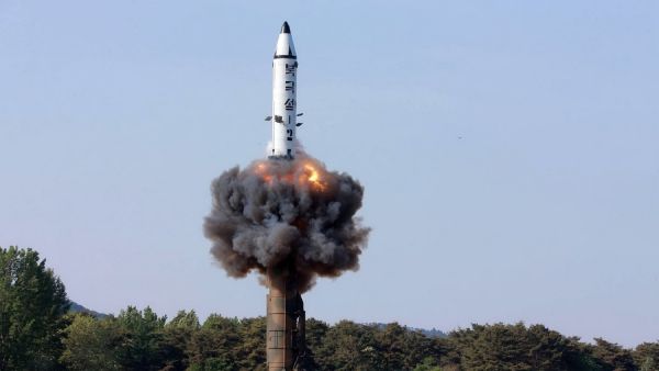 A North Korean ground-to-ground medium-to-long range strategic ballistic missile launches in a test-fire. North Korea on May 22 declared its medium-range Pukguksong-2 missile ready for deployment. (AFP/ File Photo)