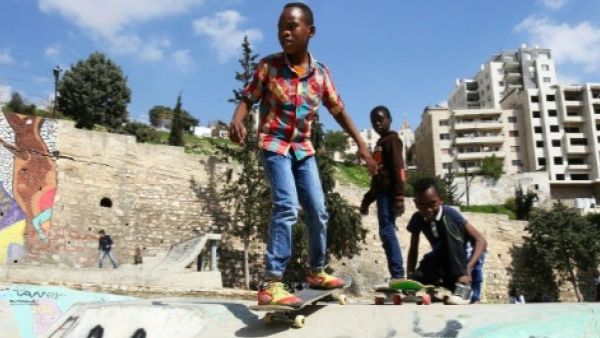 Children in the Jordanian capital Amman enjoy some fun at a skate park in Amman (AFP/File Photo)	