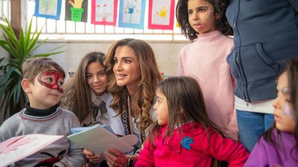 Queen Rania meets with children at Al Hussein Social Foundation for Orphans, on Wednesday (Photo courtesy of Royal Court)