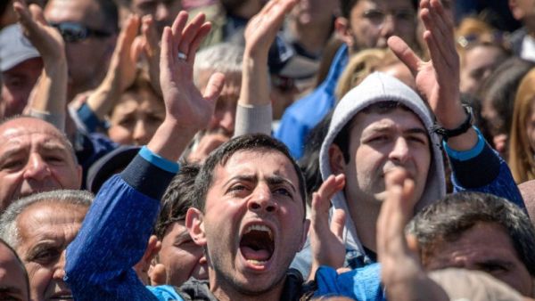 Armenians during an opposition rally in central Yerevan, the Armenian capital. (AFP/File Photo)	