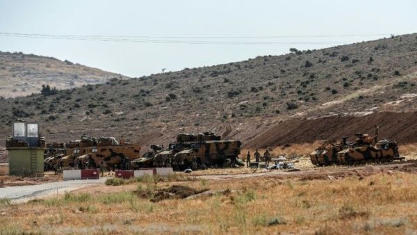 Turkish troops at the Syrian-Turkish border (AFP)