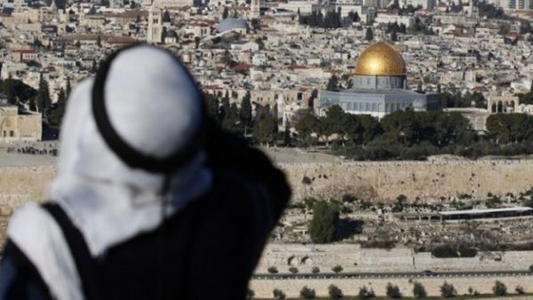A Palestinian man looks out at the Dome of the Rock in the Old City of Jerusalem. (AFP)