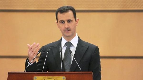 According to a timeline in a US document for dealing with the Syrian crisis, Bashar al-Assad will remain in power until at least March 2017. (AFP/File)