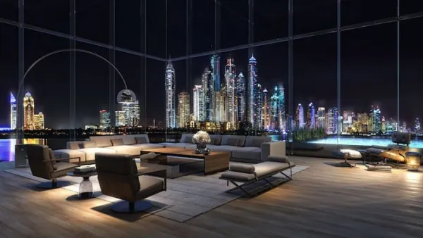 The triplex penthouse apartment spreads across 29,800 sq ft and features several living areas, five en-suite bathrooms, and almost 11,500 sq ft of exterior space. (Courtesy of Omniyat)