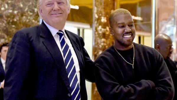 Odd couple: West, shown with Trump in December 2016 in New York City, tweeted that 'the mob can't make me not love him' while also calling him his 'brother' (Source: AFP)