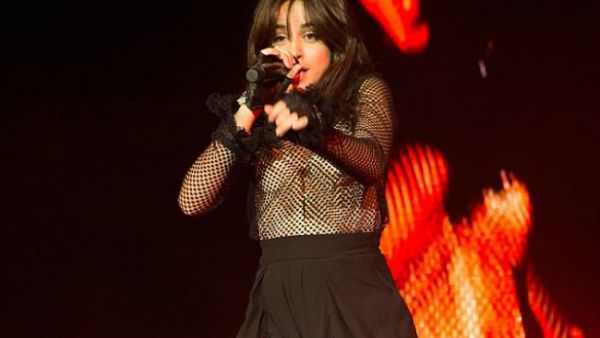 Pins on parade: Camila Cabello displayed her spectacular legs in a double split trousers as she stormed Philadelphia stage at The Fillmore (Source: REX - Shutterstock)