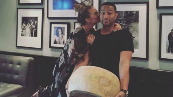 Not a new infatuation: John Legend once gifted his wife an enormous cheese for her birthday (Source: chrissyteigen - Instagram)