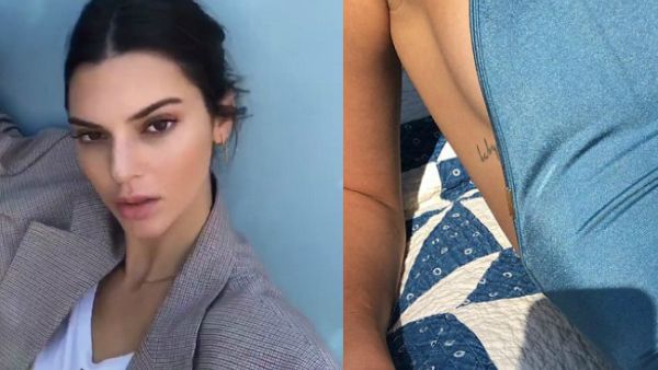 Fresh ink: Kendall Jenner appeared to tease a new tattoo of the word 'baby' on her right rib online Saturday (Source: Kendall Jenner - Instagram)