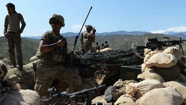 US soldiers take up positions during an ongoing an operation against IS militants in Afghanistan. -AFP