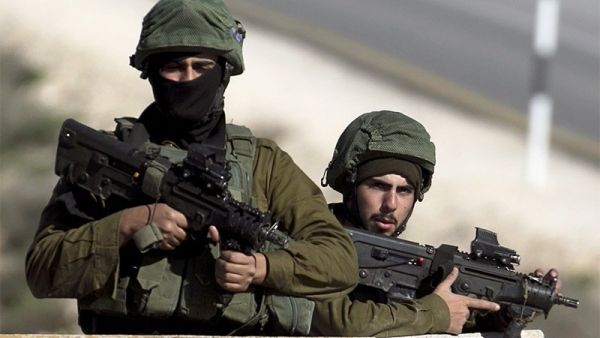 Israeli soldiers man a checkpoint near West Bank. (AFP/File)