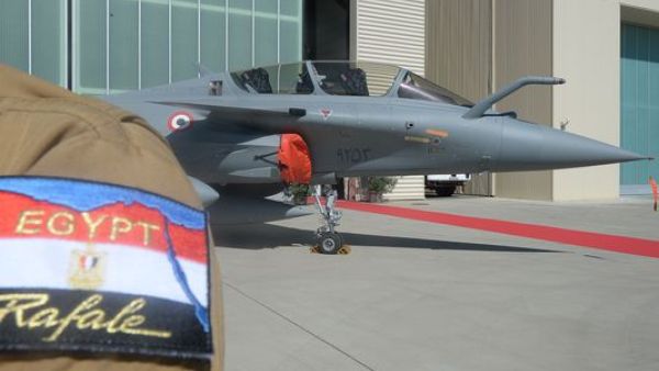 One of three French-made Rafale for the Egyptian Air Force is pictured at an air base in Istres, France, on July 20, over the shoulder of one of the Egyptian pilots trained to fly the fighter jets. (AFP/Boris Horvat)