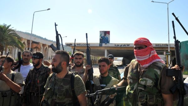 The AJACS program, established in 2014, was intended to support community policing in areas outside the Syrian regime’s control (AFP/File)