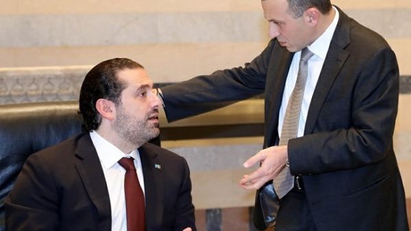 Prime Minister Saad Hariri speaks with Foreign Minister Gebran Bassil during a Cabinet session on Nov. 2, 2017. (The Daily Star)
