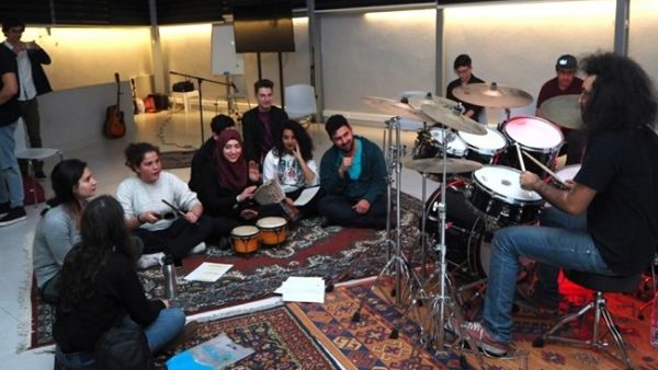 Music teacher and shopowner Mohammad Younes' drum improv during a recent session of Sidewalk Saida, at the city's Ishbilia art hub. (Photo courtesy of Sidewalk Saida)
