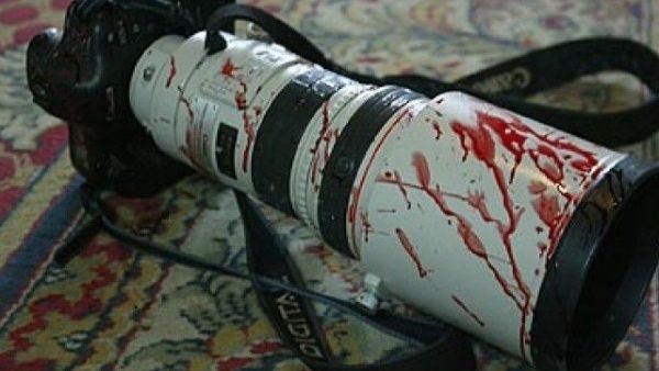 A camera's reporter in blood (AFP/File Photo)	