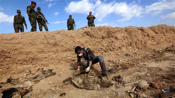 Earlier this year, army sources said security forces had stumbled upon two mass graves containing the remains of dozens of members of the Iraqi army and police who had been killed by ISIS in Hawija (AFP/File)