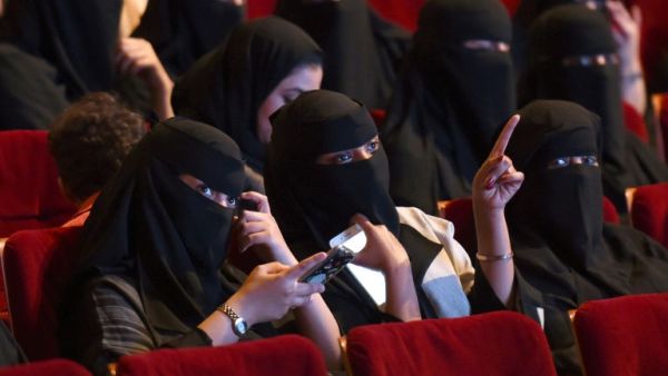 Saudi women attend a rare cinema screening at a film festival in Riyadh in October 2017 (Fayez Nureldine/AFP)