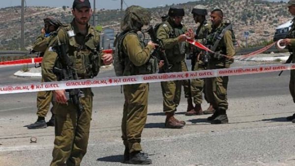 Israeli police continue to search the area for suspects. (AFP/File)