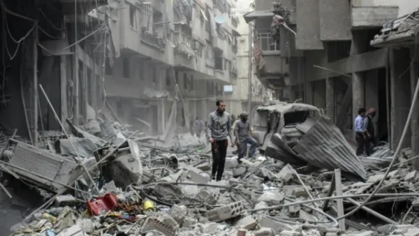 The civilian toll includes 12,517 children and 8,062 women. (AFP/ File)