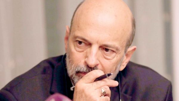 Jordanian Prime Minister Omar Razzaz during a meeting with union leaders in Amman, last June. (AFP/File)