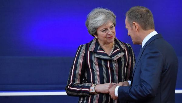  Britain's Prime Minister Theresa May (L) speaks with European Council President Donald Tusk  (AFP)