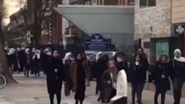 In it a man can be heard making horrendous comments about the young girls, referring to them as 'black c***s with f***** sarees on' in Bow, east London  (Facebook) 