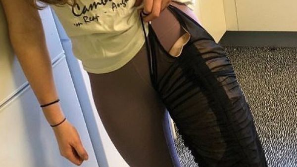 A 20-year-old student, Julia Magowan, has slammed online retailer Pretty Little Thing on Twitter as she struggles to fit into their Black Mesh Ruched Dress in a size 8 (Twitter)