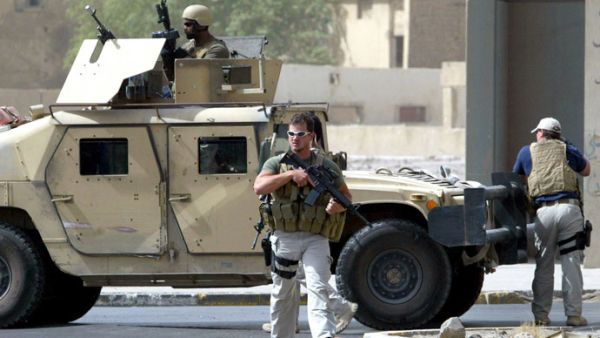 Private security contractors work on a range of defense-related operations in the Middle East and worldwide. This photo shows Blackwater contractors in Iraq. (AFP/Ahmad al-Rubaye)