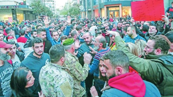 150 people gathered in central Beirut and chanted slogans against Lebanon’s politicians, calling them “corrupt.” (AFP)