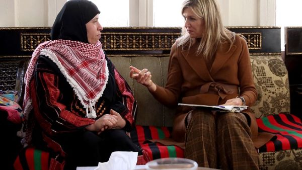 UN Secretary-General's Special Advocate for Inclusive Finance for Development, Queen Maxima of the Netherlands visits the house of Jordanian national Fatima Al Zobi (L) in Salt, some 30 kilometers north of the capital Amman, on February 11, 2019. (AFP)