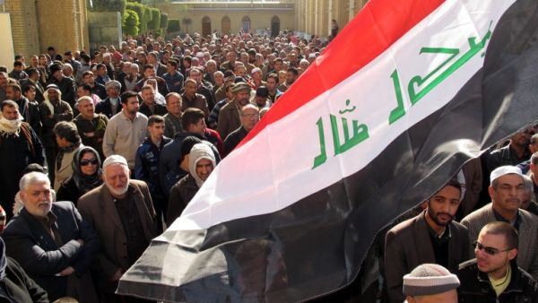 Iraqi demonstrators gather for an anti-government protest outside the Sunni Abu Hanifa mosque in Baghdad. (AFP PHOTO/KHALIL AL-MURSHIDI)
