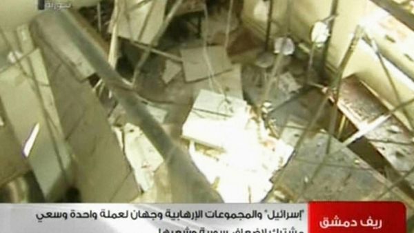 An image grab taken from the state-run Syrian TV , shows a room damaged after what Syria said was an Israeli air raid which targeted the Jamraya scientific research base on the outskirts of Damascus. (AFP PHOTO/SYRIAN TV) 