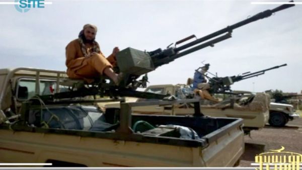 Screen shot posted on jihadist forums by a group calling itself "al-Sahara Media Foundation" reportedly shows al-Qaeda in the Islamic Maghreb (AQIM) fighters preparing for war in northern Mali. (AFP PHOTO / SITE Monitoring Service)