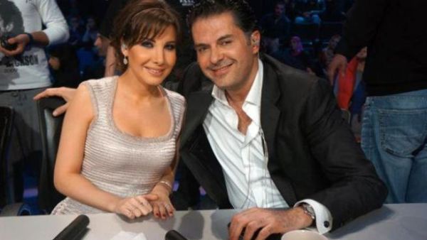Nancy Ajram (L) and Ragheb Alama behind the scenes.