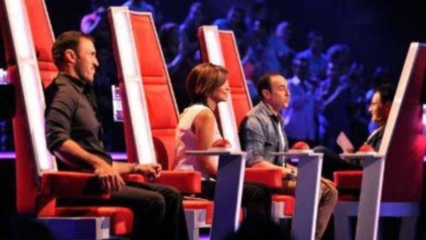 Judges on The Voice show (Sherine Abdel Wahab center).