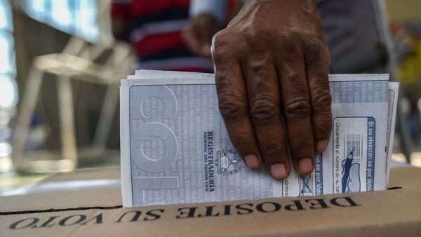 A man casts vote at polling station in Cali, Valle del Cauca Department, during parliamentary elections in Colombia. (AFP/ File)