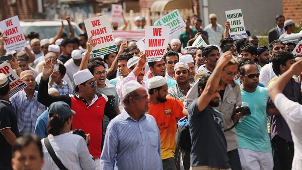 People march after a mass prayer for Imam Akonjee and his assistant in New York on Aug 15. (AFP)