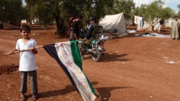 صبي سوري من اللاجئين على الحدود السورية-التركية