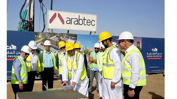 Abdulla Al Sahi CEO of Modon Properties lays first stone of the Show Village. Abdulla Al Sahi CEO of Modon Properties lays first stone of the Show Village.