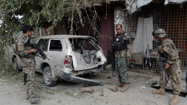 Afghan soldiers inspect a destroyed vehicle after an operation to capture Islamic State fighters in Kot District in eastern Nangarhar province on July 26, 2016. (AFP/Noorullah Shirzada) Afghan soldiers inspect a destroyed vehicle after an operation to capture Islamic State fighters in Kot District in eastern Nangarhar province on July 26, 2016. (AFP/Noorullah Shirzada)
